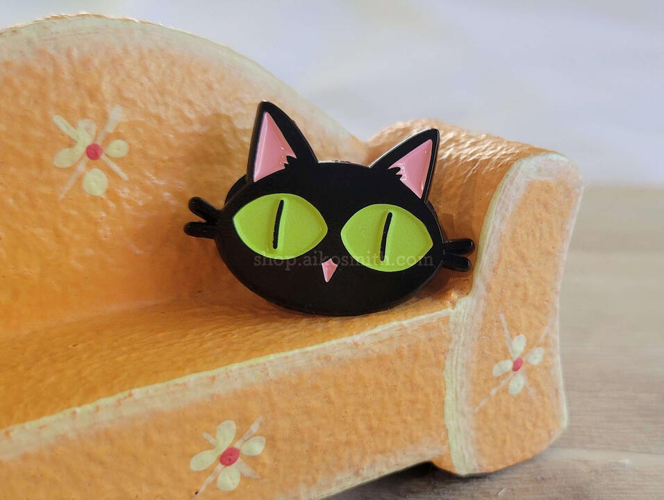 Kuroneko-sama pin on couch iykyk