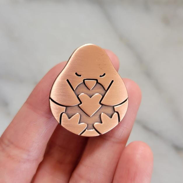 Copper Penguin Pin Close up Copper Penguin Pin Close up